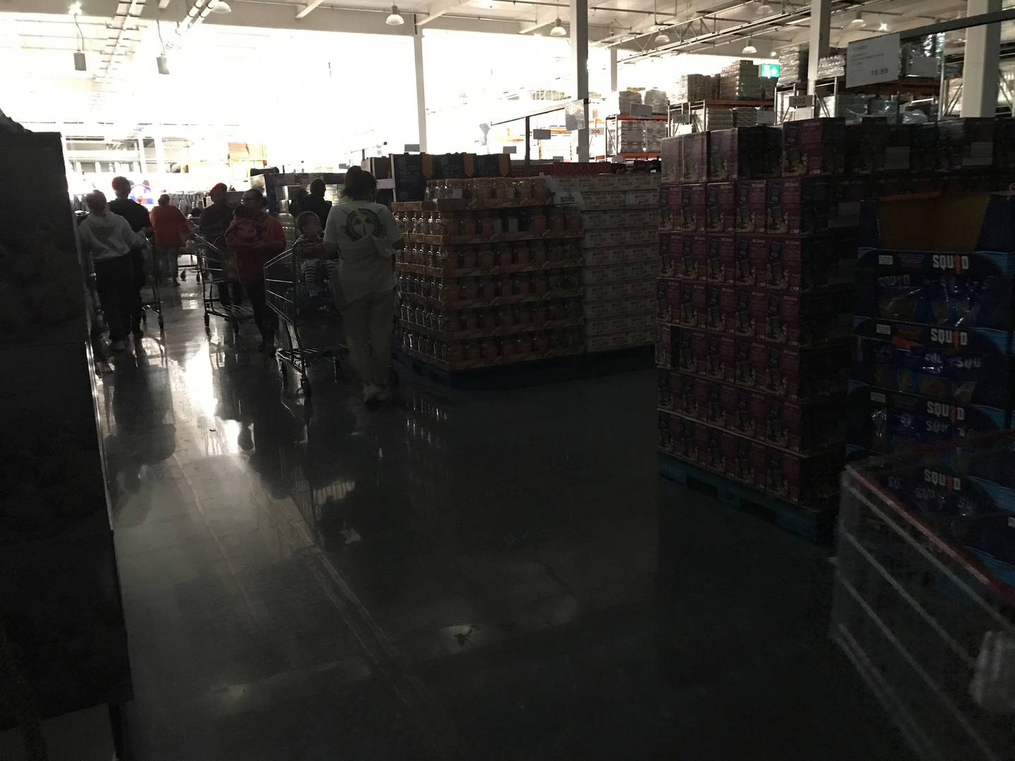 Shoppers kept wandering the aisles despite part of the Costco store losing power. Photo / Supplied