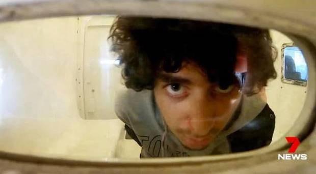Mert Ney, 21, was arrested after the stabbing event in Sydney CBD and is now under police guard. Photo / 7 News