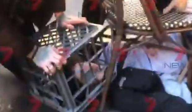 Mert Ney was restrained by cafe chairs and a milk crate by heroic bystanders. Photo / 7 News