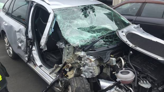 Shevaughn Johnstone was lying injured in this car when a man stole her wallet and phone. Photograph supplied Murray Howell 