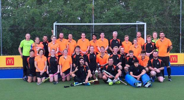 The Whanganui Invitational and Tiger Turf teams pose together after their festival match to officially open the new turf at Gonville on Sunday.