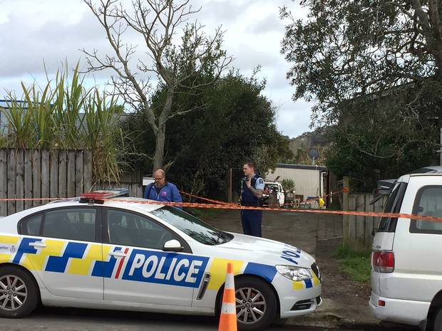 Police operate a cordon at the house on Don Buck Drive, following an explosion last night. Photo / Ryan Dunlop
