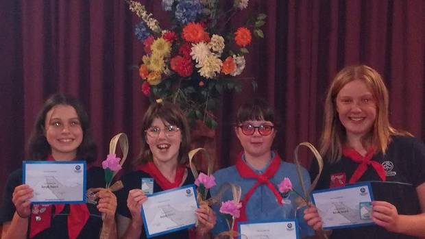 Whanganui Girl Guides (from left) Jeannie Hird, Brianna Lindsay, Charlotte Hardy and Autumn Lilley with their Aoraki Awards.