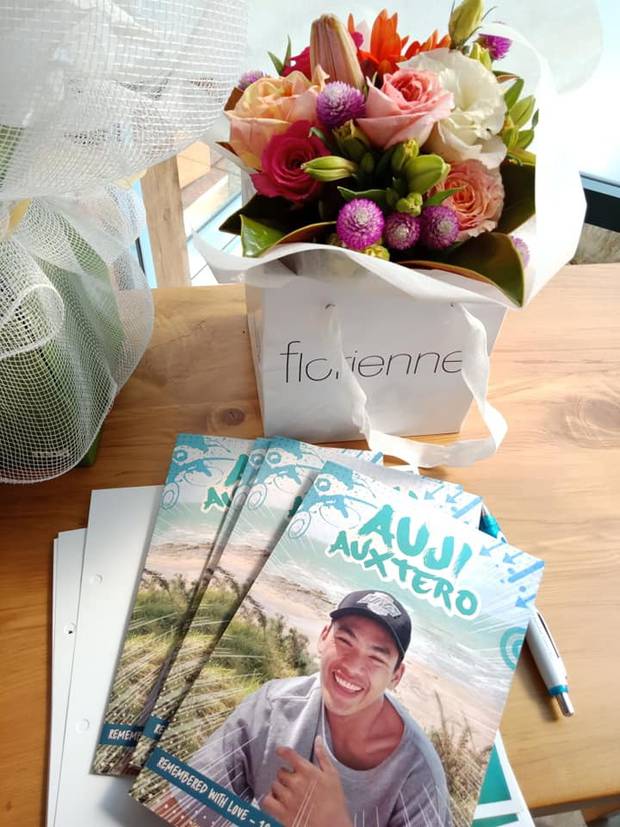 The memorial booklet for the funeral of Auji Auxtero. Photo / Supplied.