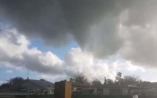 The mini-tornado as it leaves Matamata on Monday afternoon. Photo / Selena Page