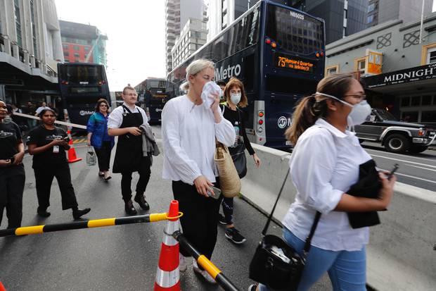 SkyCity has been evacuated as the black smoke billows from the neighbouring building. Photo / Dean Purcell