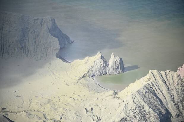 White Island covered in ash after Monday's eruption. Photo / George Novak 