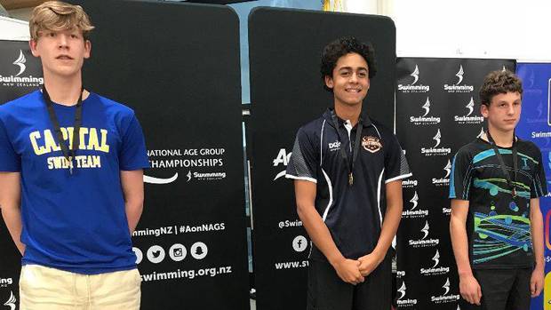 Rotorua's Joshua Balmer (centre), 14, won gold in the 1500m freestyle at the New Zealand Age Group Swimming Championships. Photo / Supplied