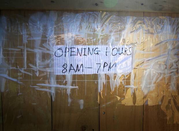 A sign on the gate to the property. 