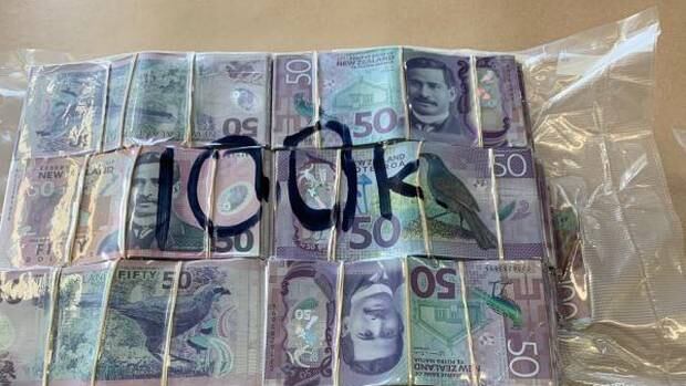Hundreds of thousands of dollars (pictured) recovered during search warrants in Auckland and Tokoroa at the beginning of the month. Photo / Police 