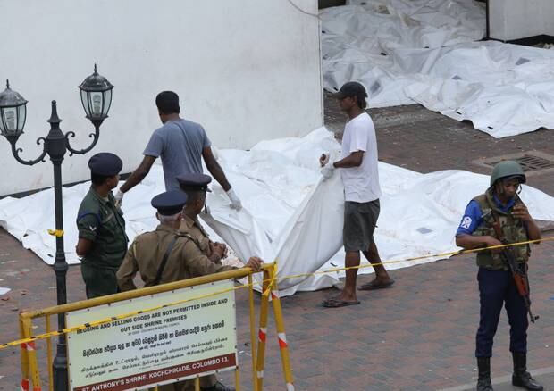 Dead Bodies are carried away for identification in front of the St Anthony's Church where one explosion took place in Kochchikade, Colombo. Photo / Getty