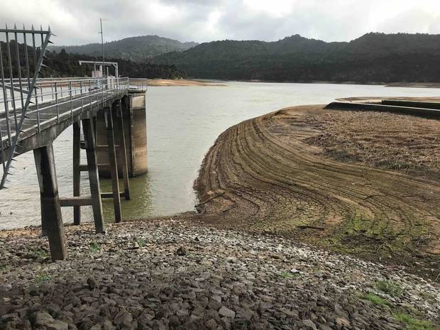 The Lower Nihotupu Dam in the Waitakere Ranges at less than 50 per cent of storage capacity at May 3. Photo / Watercare