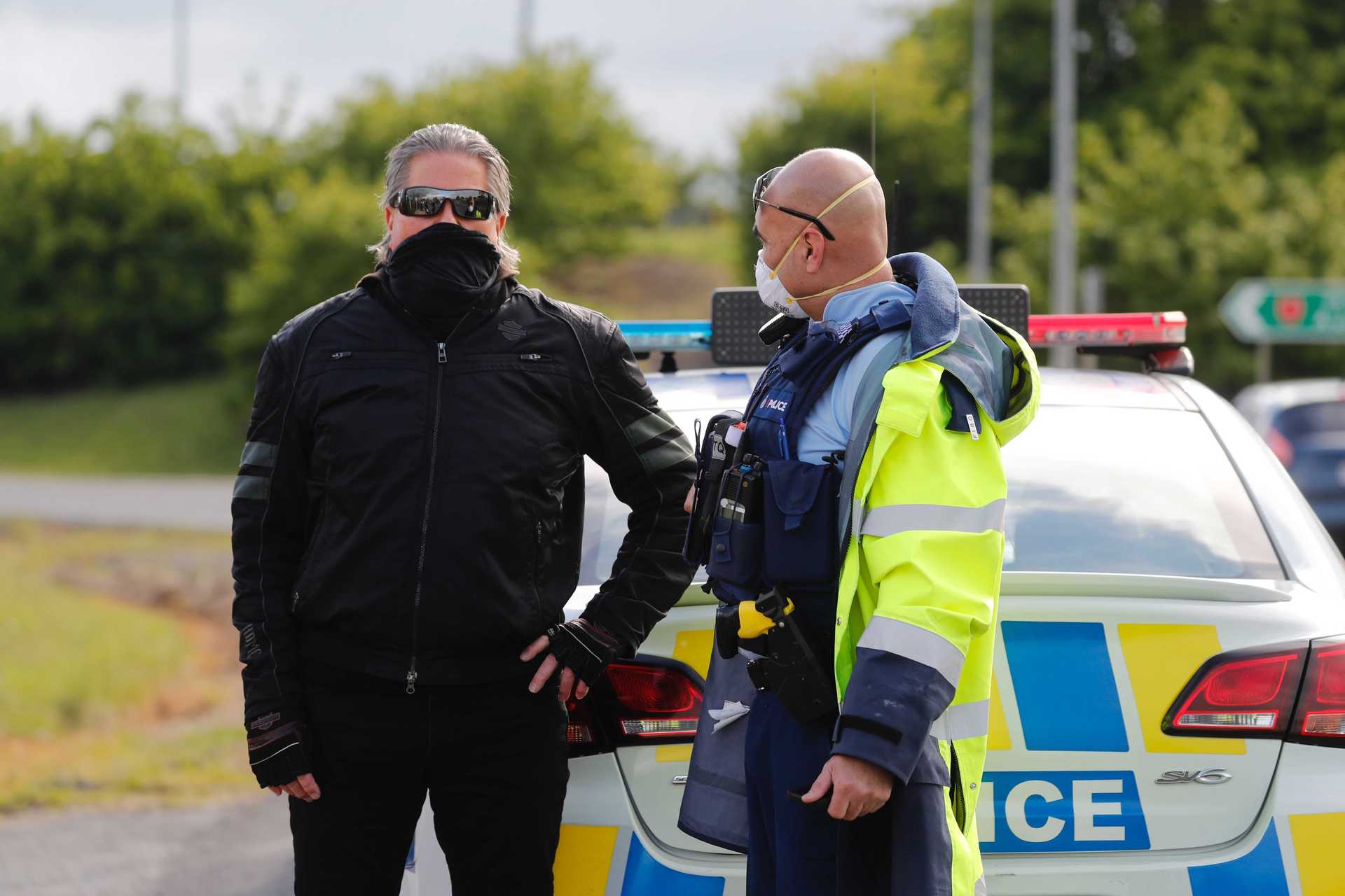 Destiny Church leader Brian Tamaki meets with a police officer in South Auckland ahead of a planned anti-lockdown rally today. Photo / Dean Purcell