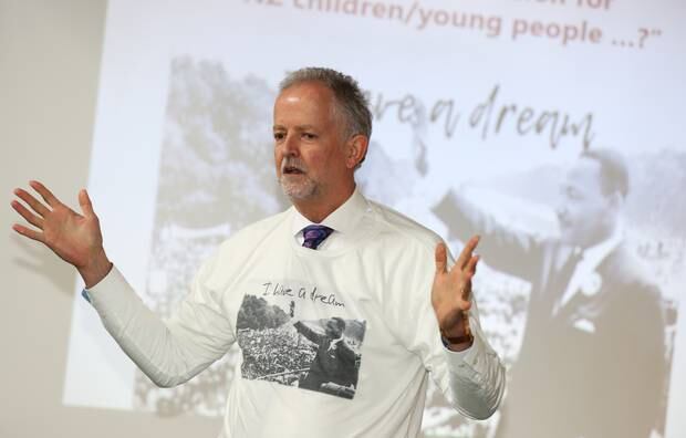 Andrew Becroft, pictured speaking this month in Northland, wants all schools to document evidence-based anti-bullying schemes by the start of next year. Photo / Michael Cunningham, Northern Advocate