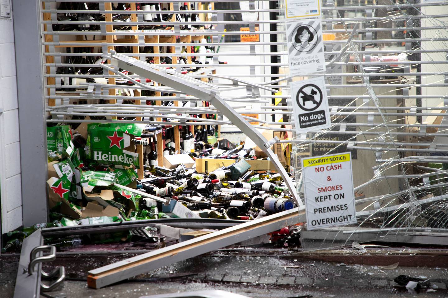 The aftermath of yet another overnight ram raid at the Ōrākei Fine Wines & Spirits liquor store. Photo / Hayden Woodward