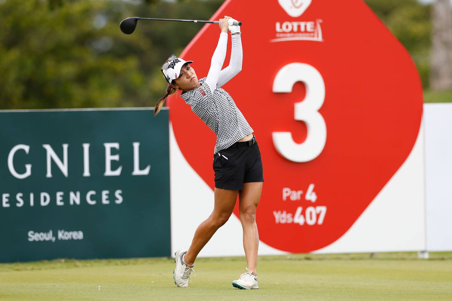 Lydia Ko, of New Zealand, drives off the third tee during the final round of the Lotte Championship. Photo / AP