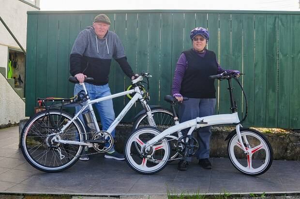 Cycle Forward participant Ann Blackwell (right), with husband Dean Blackwell, has more confidence to ride her e-bike after completing the programme.