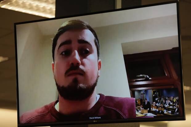 Grace Millane's brother reading his impact statement during the sentencing of her killer. Photo / Dean Purcell