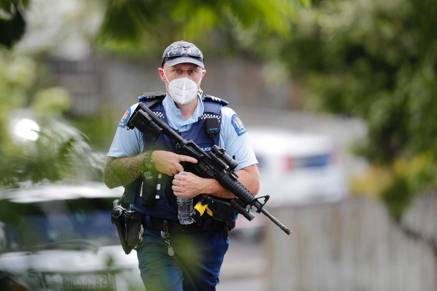 A heavy armed police presence remains in Glen Eden. Photo / Dean Purcell