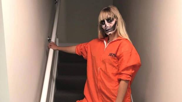 Rouxle Le Roux posted a picture of herself wearing an orange prison jumpsuit on Instagram. Photo / Instagram