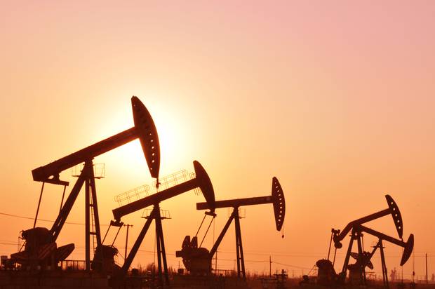 Oil prices spiked to their highest level since 2014 last week as US President Donald Trump pulled out of the Iran nuclear deal and threatened to impose new trade sanctions. Photo / AP