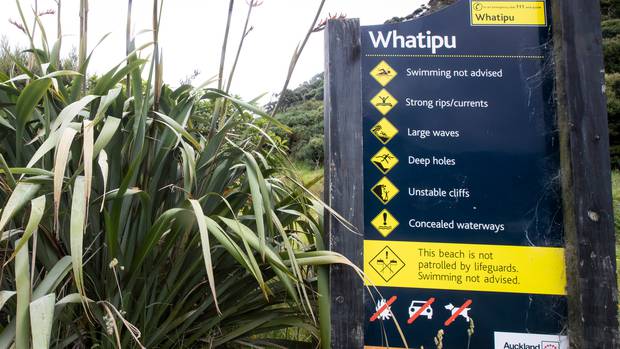 Swimming not advised sign at Whatipu Beach. Photo / Jason Oxenham