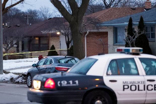Police seen outside house after shooting at in Milwaukee. Photo / AP