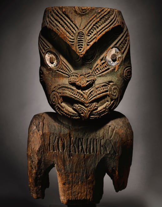 Rare Māori artefacts including carving exhibited by the