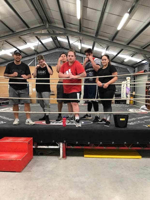 At the boxing gym are (from left) specialist case worker Jacob Makara-Moreland, Darcey Chambers, Wiremu Tamehana, Braxton Nikora-Whale, specialist case worker Jesse Hamilton-Hall and Tala Thompson.