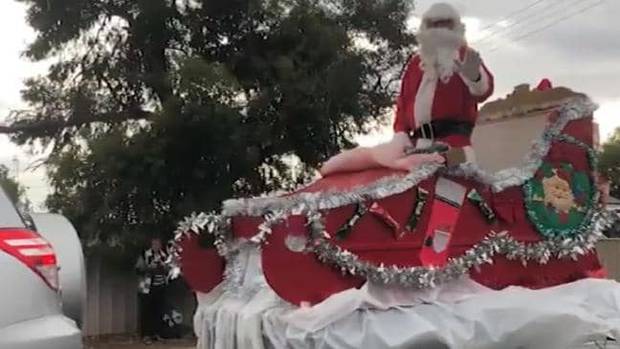Father Christmas during the Morgan Christmas Pageant. His driver was fined $300 for towing an unsecured load. Photo / 7 News