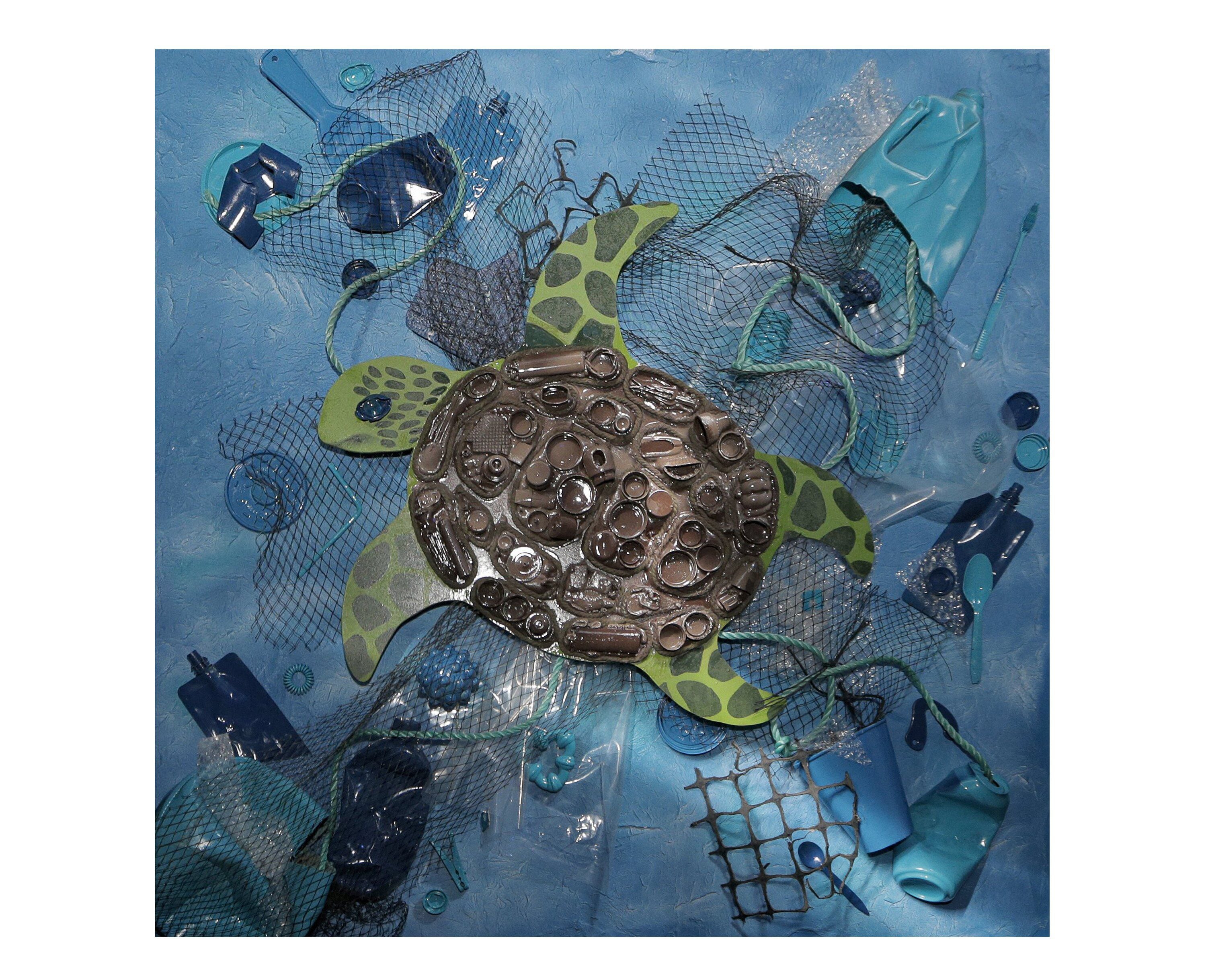 An artist working on a sculpture made from recycled plastic on a beach, with the ocean in the background