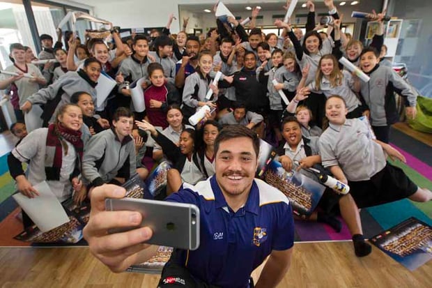 SELFIE: Steamers prop Jordan Lay takes a picture with Rotorua Intermediate pupils. PHOTO/BEN FRASER