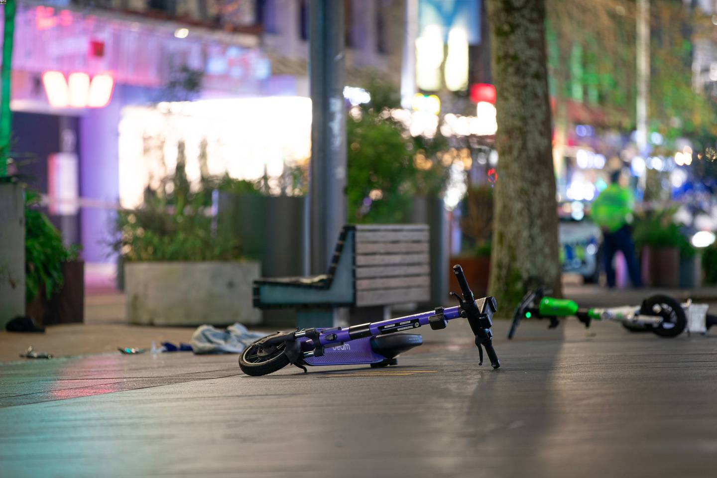 Electric scooters were abandoned on Lower Queen St following a shooting incident last night. Photo / Hayden Woodward