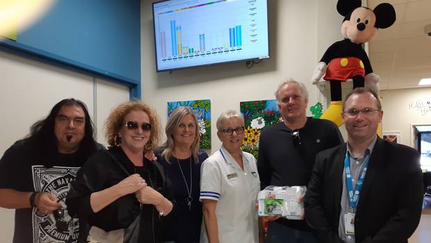 Vouchers are presented to Whanganui Hospital. From left: Fred Loveridge, Kerry O'Sullivan, Marian Butler, Trish Silk, Dean Butler and Russell Simpson. Photo / Supplied