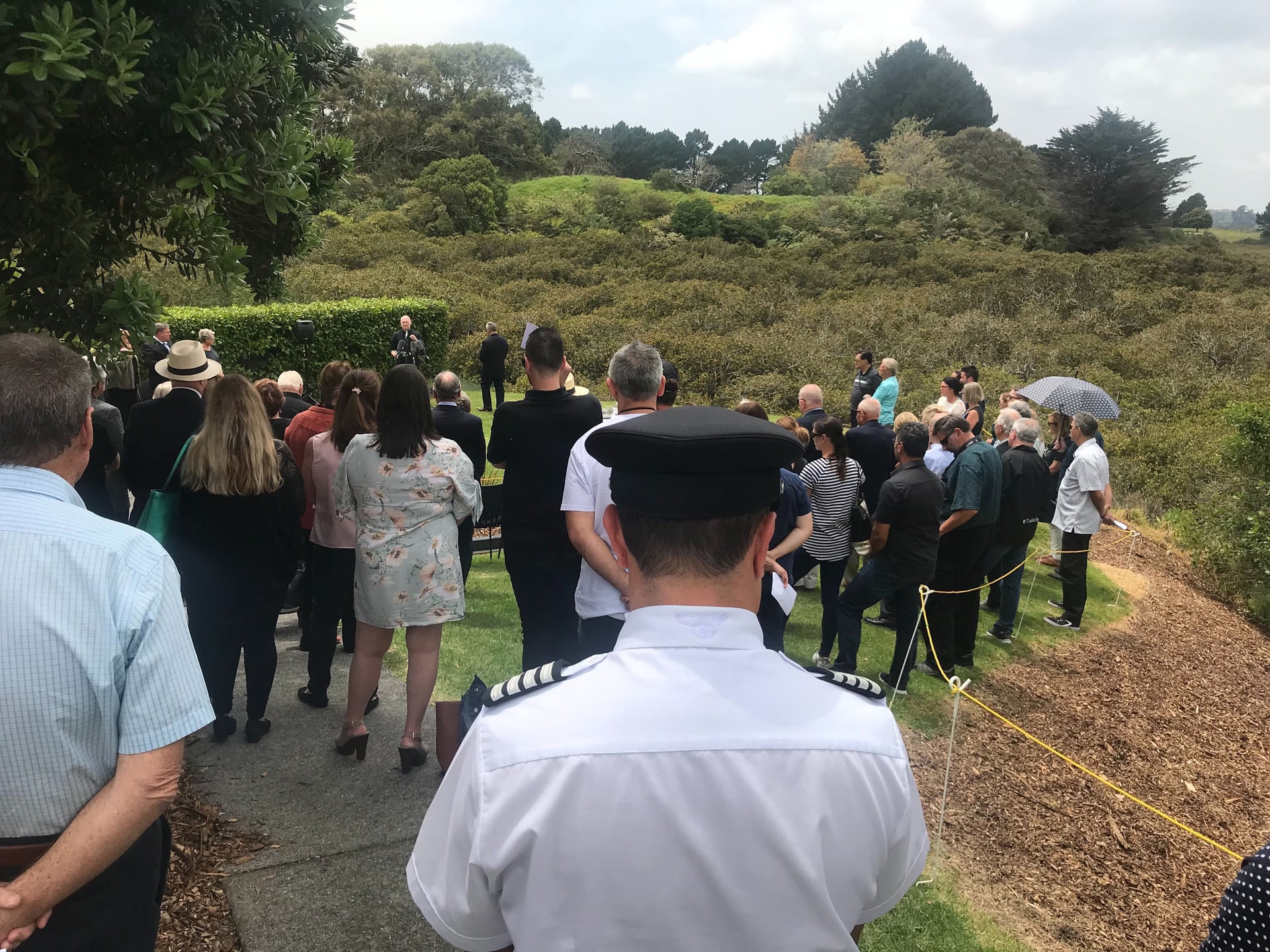 People gather for the unveiling of a memorial to the crew and passengers onboard the Air New Zealand flight 901 that crashed into Mt Erebus on Antarctica. Photo / Grant Bradley