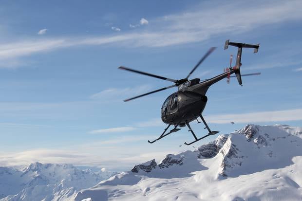 Nick Wallis was flying a Hughes 500, like the one left, in the Wanaka crash.