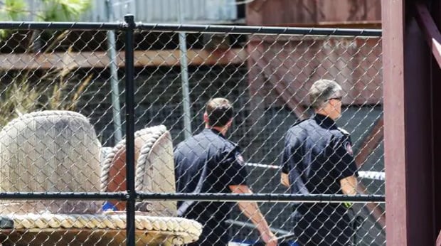 Police at Dreamworld the day after four people died on the Thunder River Rapids ride, Coomera. Photo / News Corp Australia