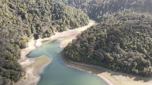 An aerial view of the shocking water level at Whau Valley Dam which will be shut down if insufficient rain fell in winter. Photo / Supplied