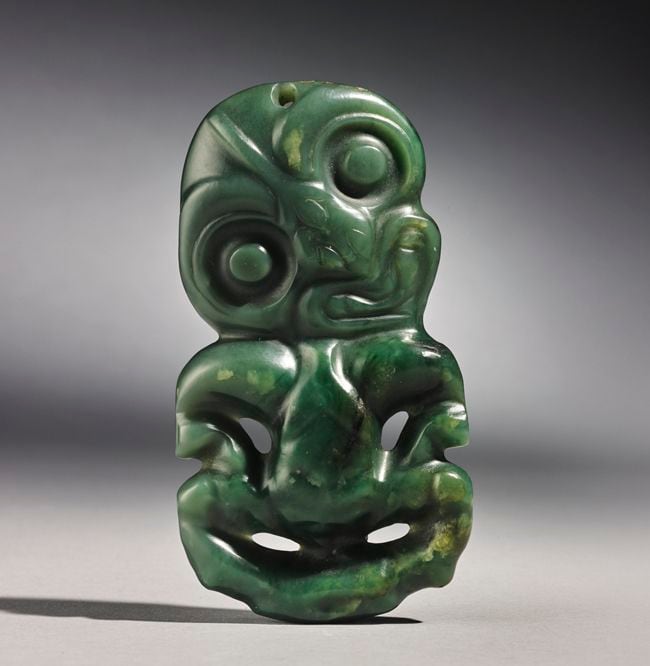 Rare Māori artefacts including carving exhibited by the