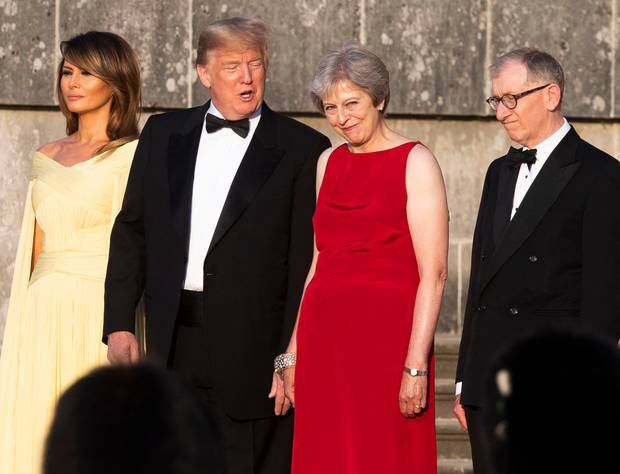 From left, first lady Melania Trump, President Donald Trump, British Prime Minister Theresa May, and her husband Philip May, watch the arrival ceremony at Blenheim Palace. Photo / AP