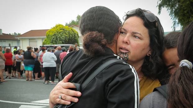 Flaxmere Primary School teacher Phillippa Watson consoles pupils after the lockdown. Photo / Warren Buckland