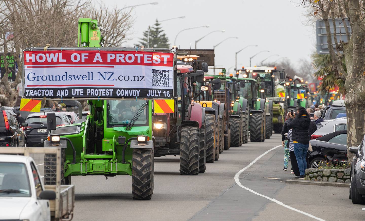A large convoy of tractors, farm machinery and utes on Oxford Street, Levin. Photo / Mark Mitchell