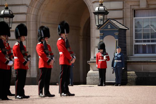 A member of The Queen's Guard's, from the Royal Canadian Air Force (RCAF) takes her position to begin guard duty. Photo / AP