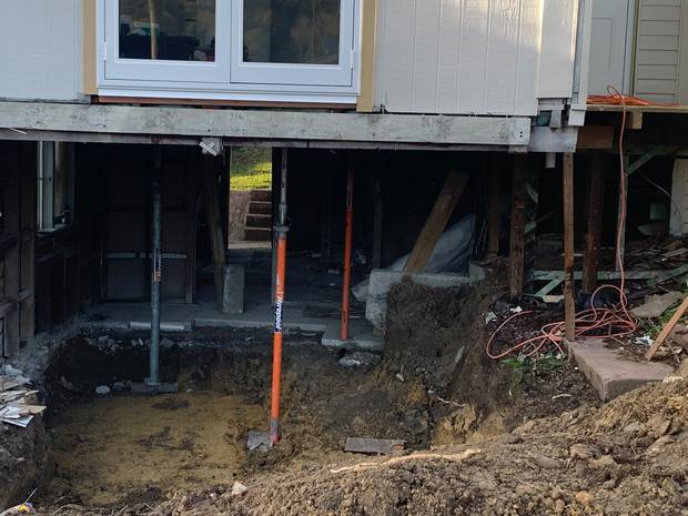 Neighbour John Holley said he had concerns about the initial bracing that held up the upper level of the house. Photo / John Holley