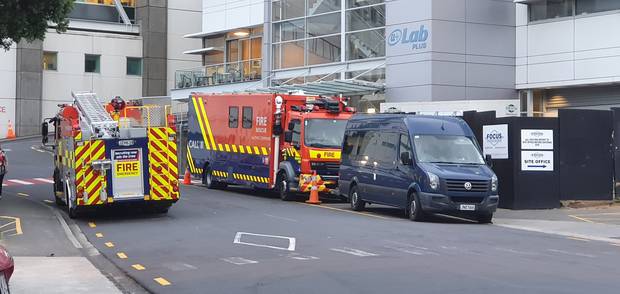 Fire and Emergency, as well as the Disaster Victim Identification van, outside Auckland City Hospital morgue. Photo / File