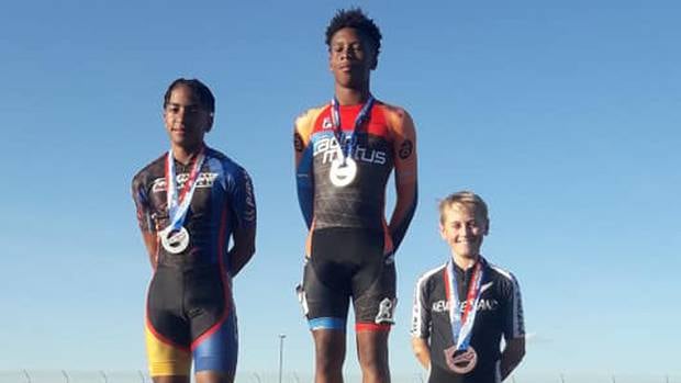 Chase Morpeth, right, with his 100m sprint bronze medal at the USA National Track and Road Championships last month, at Pikes Peak International Raceway in Colorado.