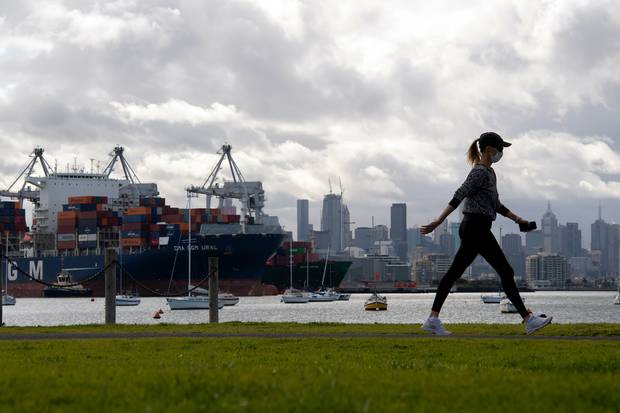 A woman takes a walk in a park during lockdown due to the continuing spread of the coronavirus in Melbourne earlier this month. Photo / AP