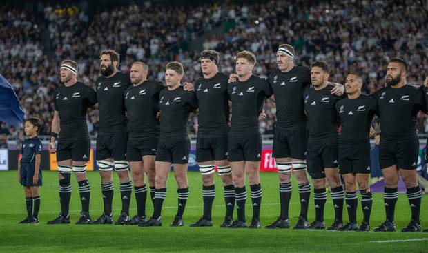 The All Blacks sing the national anthem before their Rugby World Cup semi-final match against England, in Japan. Photo / Mark Mitchell