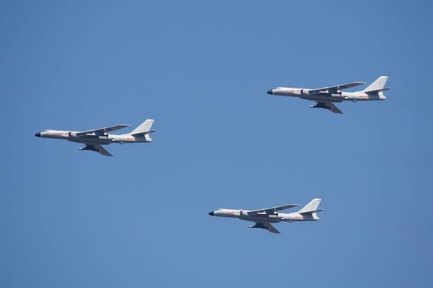 H-6K cruise missile carriers fly in formation during a parade commemorating the 70th anniversary of Japan's surrender during World War II in Beijing in 2015. Photo / AP