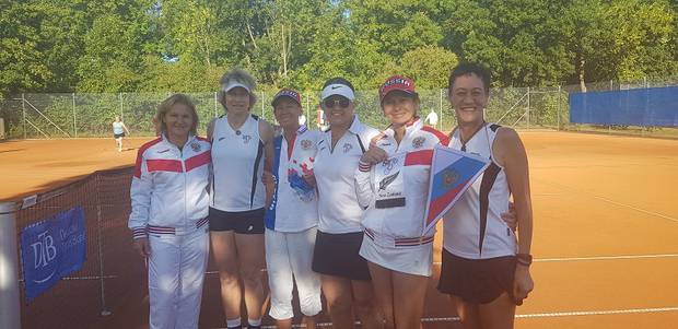 The New Zealand women's 55+ tennis team with their Russian counterparts at the ITF Senior World Tennis Championships in Germany. Photo / Supplied